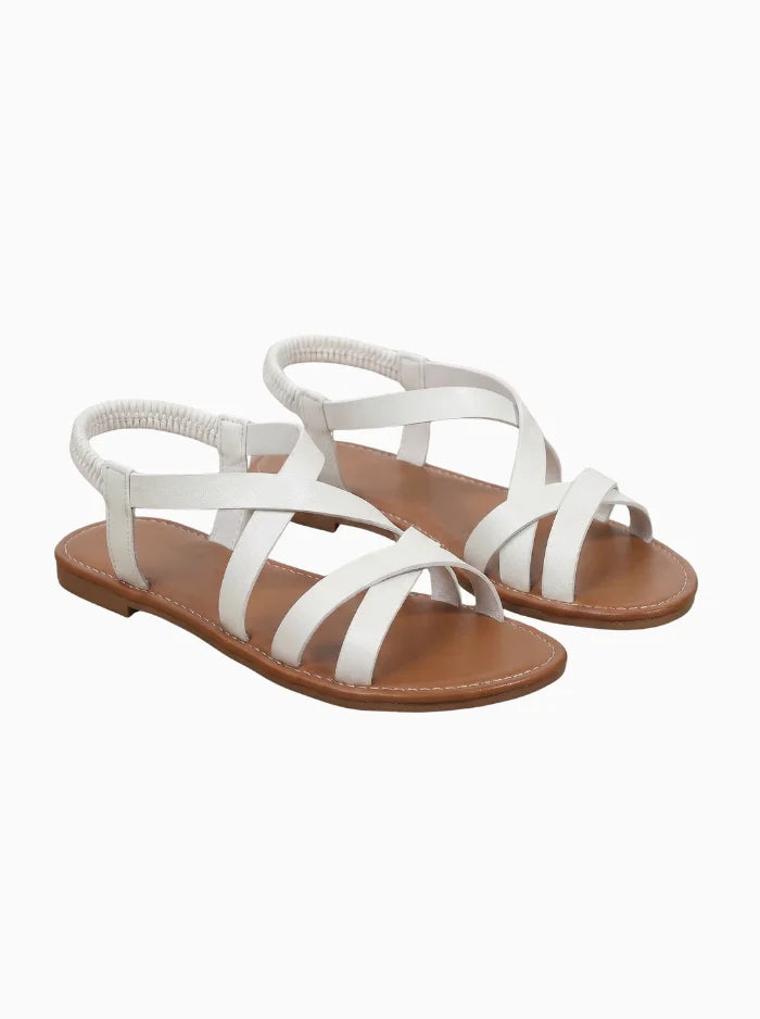 Elegante goldene Criss-Cross flache Sandalen für Damen.