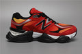 New Balance 9060 Rot Orange Sneakers für jeden Anlass.