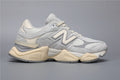 New Balance 9060 Grau Weiß Sneakers für Herren und Damen.