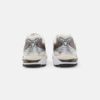 ASICS Gel-Kayano 14 Sneakers in Creme Schwarz Metallic Pflaume 3