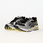 ASICS Gel-Kayano 14 Schwarz Lemon Spark Sneakers für sportliche Aktivitäten. 2